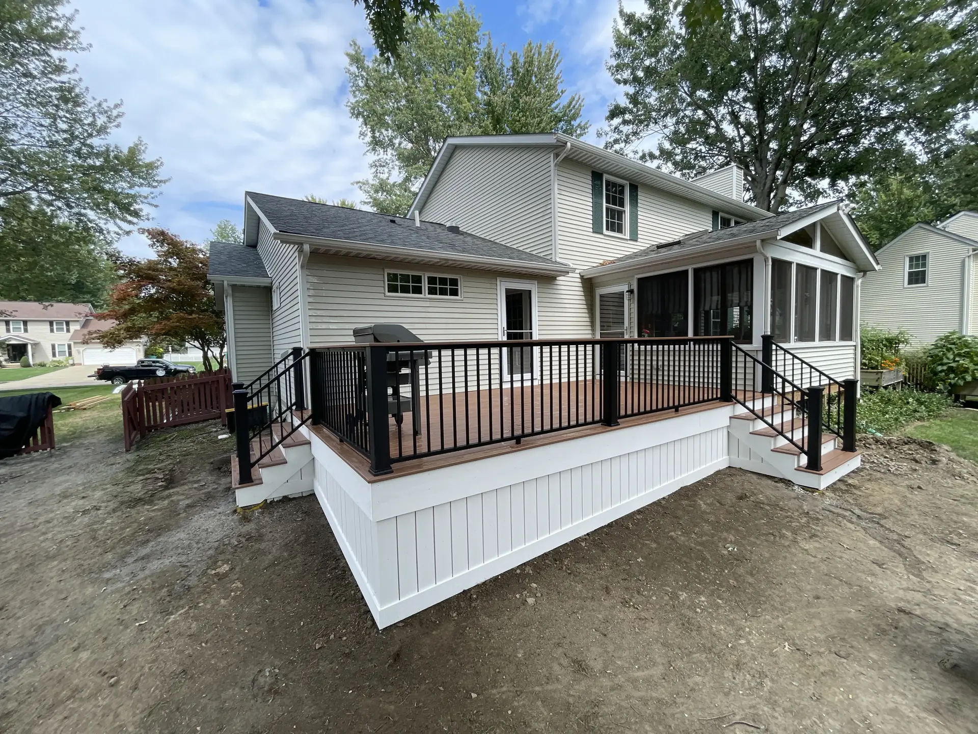 Finished deck rear of house